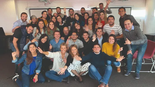 Young women filling out a worksheet at EAE Business School