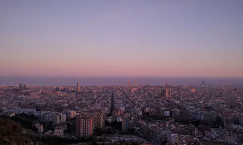 The city of Barcelona at dusk